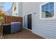 Rear deck featuring BBQ and sliding glass doors and gray siding at 106 Madison Square Ln, Cary, NC 27513