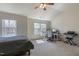 Comfortable bedroom with bed, desk, and music keyboard at 106 Madison Square Ln, Cary, NC 27513