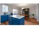 Open kitchen and dining area with modern appliances and a sliding glass door at 106 Madison Square Ln, Cary, NC 27513