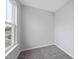 A cozy bedroom offers a peaceful retreat with natural light streaming through the window at 108 Ripple Way # 319, Clayton, NC 27520