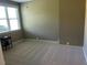 Well-lit bedroom featuring neutral paint, carpeted floors and a window with views at 1101 Dovefield Ln, Youngsville, NC 27596