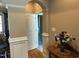 Inviting entryway with archway, white trim, and a view into the next room at 1101 Dovefield Ln, Youngsville, NC 27596