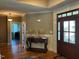 Welcoming foyer with hardwood floors, elegant trim, and an inviting entryway at 1101 Dovefield Ln, Youngsville, NC 27596