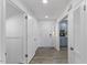 Open foyer with hardwood floors and fresh paint at 1101 Driftwood Dr Dr, Siler City, NC 27344