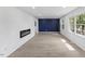 Bright living room features a dark blue accent wall and lots of natural light at 1101 Driftwood Dr Dr, Siler City, NC 27344