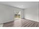 Bright room with plank flooring and sliding doors overlooking the backyard at 1128 Centerview Drive, Nashville, NC 27856