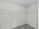 Walk-in closet with neutral carpet and wire shelving at 1128 Centerview Drive, Nashville, NC 27856