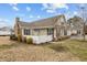 Charming single-story home featuring manicured landscaping and a white picket fence at 1159 Blue Bird Ln, Wake Forest, NC 27587