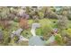 Aerial view of a house situated on a cul-de-sac with mature landscaping at 118 Tysor Cir, Graham, NC 27253