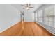Bright bedroom featuring hardwood floors, large windows, and ample natural light at 118 Tysor Cir, Graham, NC 27253