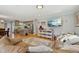 Spacious living room leading into the kitchen, featuring hardwood floors and stylish decor at 1213 Lincoln St, Durham, NC 27701