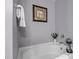 Inviting bathtub with calming gray walls and elegant decor at 1295 Kerr St, Burlington, NC 27215