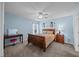 Cozy bedroom with blue walls, desk area, and comfortable furnishings at 1295 Kerr St, Burlington, NC 27215