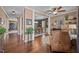 Open-concept living and dining area featuring hardwood floors and stylish decor at 1295 Kerr St, Burlington, NC 27215