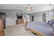 Spacious main bedroom with vaulted ceiling, dresser and television at 1295 Kerr St, Burlington, NC 27215