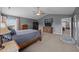Spacious main bedroom with vaulted ceiling, dresser and television at 1295 Kerr St, Burlington, NC 27215
