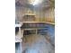 Storage shed interior featuring work benches and storage shelving at 1314 Hearthside St, Durham, NC 27707