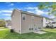 Backyard featuring a lush lawn and view of the house at 1320 Rushing Creek Pkwy, Raleigh, NC 27610