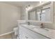 Bathroom with white marble countertops and double sinks at 1320 Rushing Creek Pkwy, Raleigh, NC 27610
