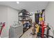 Spacious basement storage area with sturdy shelving and a chest freezer at 1624 Pantego Trl, Cary, NC 27519