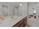 Functional bathroom features a double sink vanity with good lighting at 1624 Pantego Trl, Cary, NC 27519