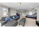 Spacious main bedroom with a seating area, a tray ceiling, and ample natural light at 1624 Pantego Trl, Cary, NC 27519