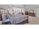 Spacious primary suite with a king bed, dresser, and sitting area, creating a comfortable retreat at 1624 Pantego Trl, Cary, NC 27519