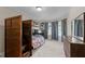Bedroom with a bunk bed, bay window, carpeted floor, and dresser at 1824 Longmont Dr, Wake Forest, NC 27587