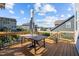 Spacious wood deck overlooking the backyard and neighborhood at 1824 Longmont Dr, Wake Forest, NC 27587