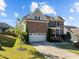 Beautiful brick home featuring a two-car garage and manicured front lawn at 1824 Longmont Dr, Wake Forest, NC 27587