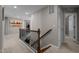 Upstairs hallway with carpet and beautiful railings at 1824 Longmont Dr, Wake Forest, NC 27587