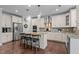 Modern kitchen with stainless steel appliances, granite countertops, and an island with seating at 1824 Longmont Dr, Wake Forest, NC 27587