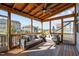 Screened porch featuring comfortable seating, a ceiling fan, and views of the backyard at 1824 Longmont Dr, Wake Forest, NC 27587