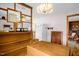 Dining room showcasing natural wood furnishings and decorative elements, creating a warm and inviting atmosphere at 200 N 9Th St, Erwin, NC 28339