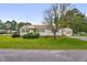 Charming single-story home with a well-maintained lawn and attached garage; perfect for suburban living at 200 N 9Th St, Erwin, NC 28339
