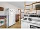 Spacious kitchen featuring vintage appliances, ample storage, and a layout conducive to meal preparation at 200 N 9Th St, Erwin, NC 28339