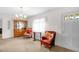 Cozy living room featuring elegant furnishings, carpet, and warm lighting; ideal for entertaining guests at 200 N 9Th St, Erwin, NC 28339