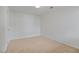 A simple carpeted bedroom with natural light at 2011 Wolftech Ln # 203, Raleigh, NC 27603