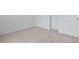 Bedroom with carpet flooring and multiple closets, perfect for storage at 2011 Wolftech Ln # 203, Raleigh, NC 27603