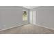 Neutral bedroom with window and closet at 209 Kellerhis Dr, Apex, NC 27502