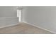 Bedroom with neutral paint, soft carpet, and white trim at 209 Kellerhis Dr, Apex, NC 27502
