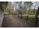 Large wooden deck providing ample space for outdoor entertaining and relaxation at 221 Lane Of Tristram, Garner, NC 27529