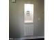 Unique wall niche with built-in lighting and a decorative painting, adding character to the home at 221 Lane Of Tristram, Garner, NC 27529