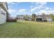 Large backyard with plenty of space, bordered by fences and trees at 225 Beckwith Ave, Clayton, NC 27527