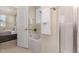 Bathroom with a corner tub next to the shower and an open door to the main bedroom at 225 Beckwith Ave, Clayton, NC 27527