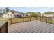 Wooden deck area showcasing views of the yard and surrounding neighborhood at 225 Beckwith Ave, Clayton, NC 27527