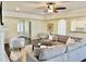 Bright and airy living room with an open floor plan and neutral decor at 225 Beckwith Ave, Clayton, NC 27527