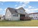 Exterior of home showing the backyard and deck space with fencing at 225 Beckwith Ave, Clayton, NC 27527