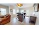 Stylish bar area with a wine fridge, sink, seating, and convenient access to the dining space at 238 N Main St, Wake Forest, NC 27587