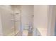 Modern bathroom features a glass-enclosed shower, a sleek toilet, and a stylish sink at 238 N Main St, Wake Forest, NC 27587